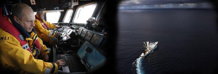 A crew using FleetBroadband on the bridge of a working vessel
