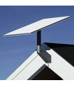 Starlink Standard wall mounted on a house against blue sky thumbnail